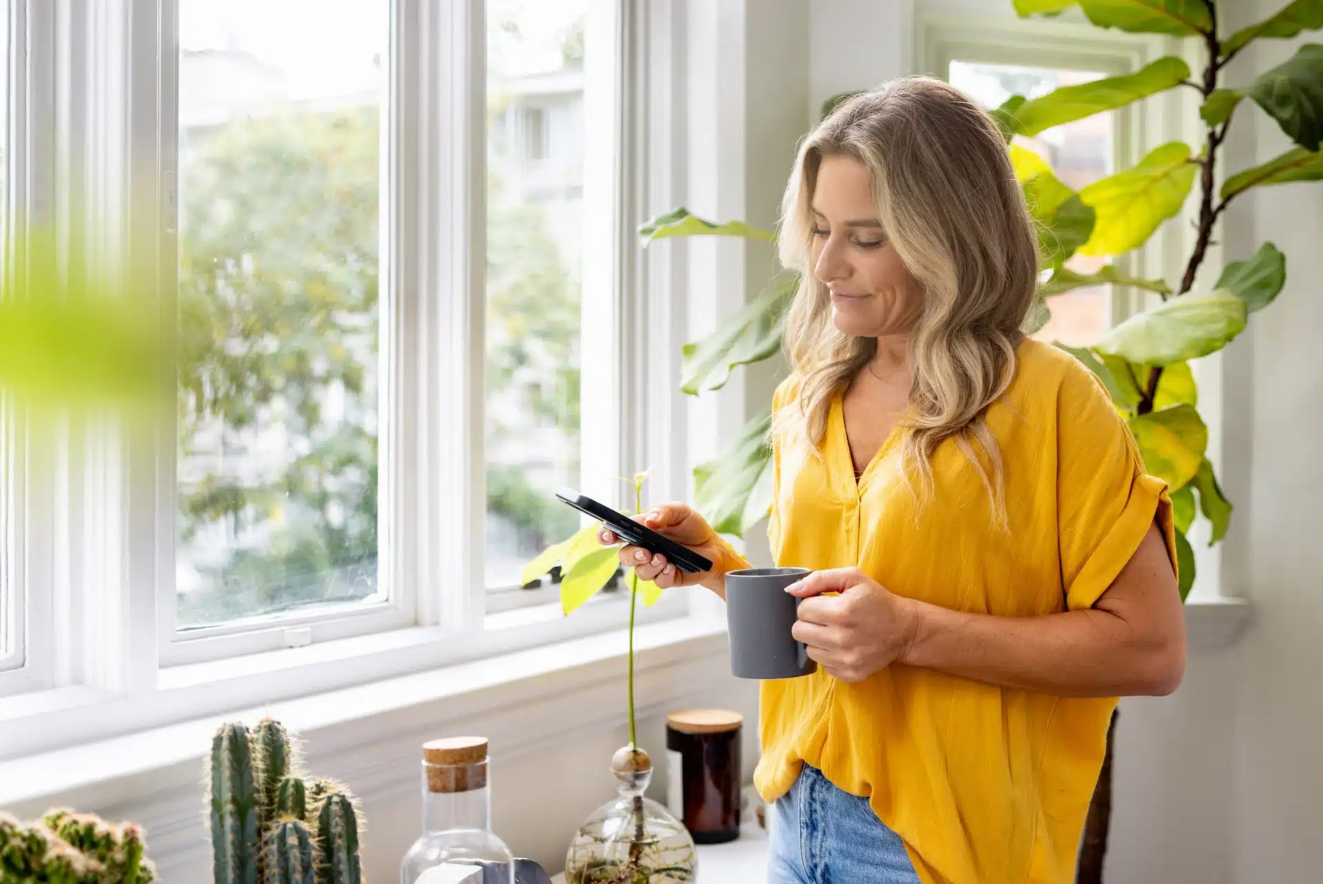 woman-working-on-her-phone New Build Property Conveyancing and the Process